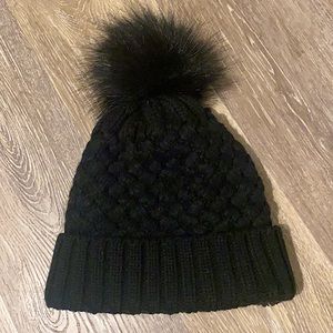 Black Pom beanie with fuzzy lining